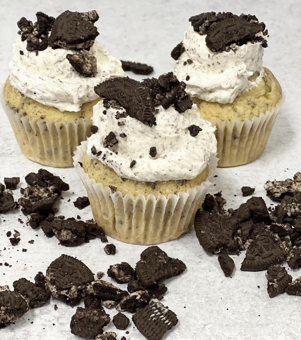 Cookies and cream cupcake topped with cookie crumbles